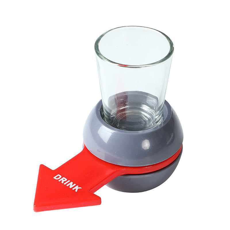 Spin the shot game with arrow and glass for fun drinking activity.