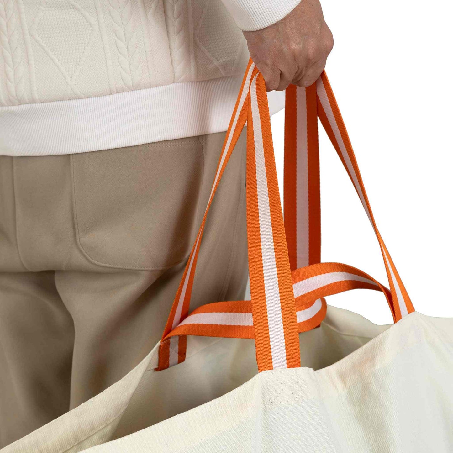 Canvas 70L shopping bag with orange handles, ideal for carrying heavy items up to 20kg.