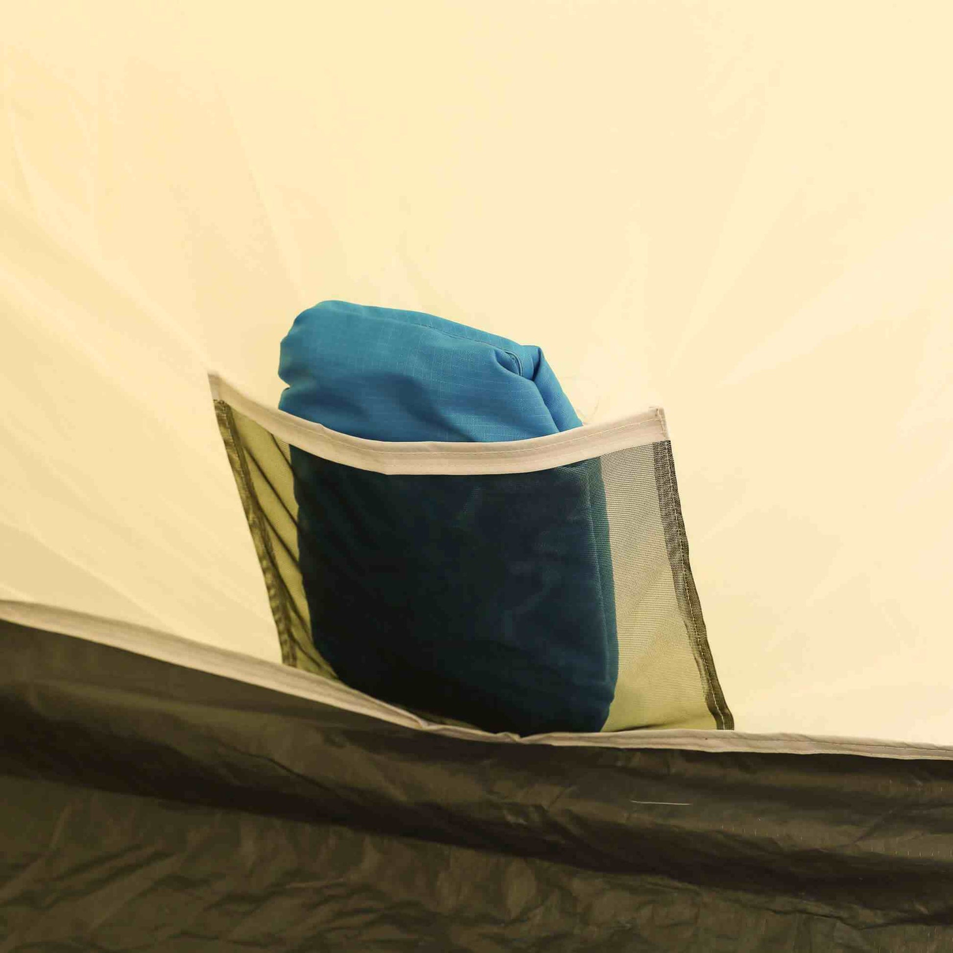 Mesh storage pocket inside pop up tent for 2 people.