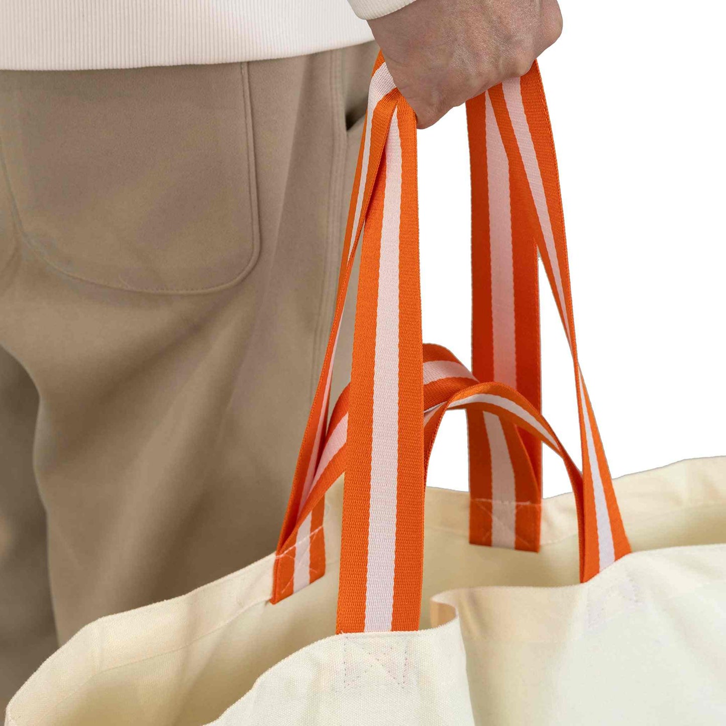 40L canvas shopping bag with orange handles, durable for carrying up to 20 kg.